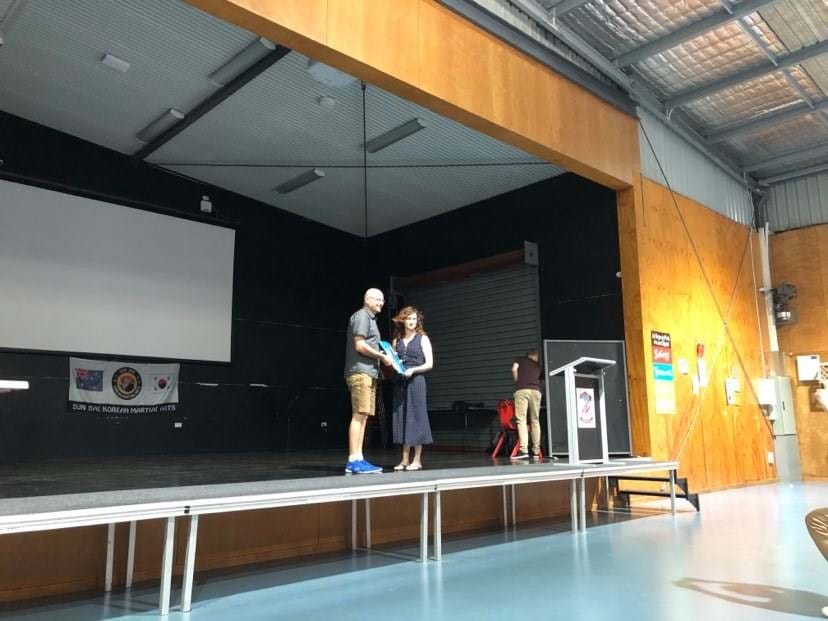 Instructor Essi receiving award