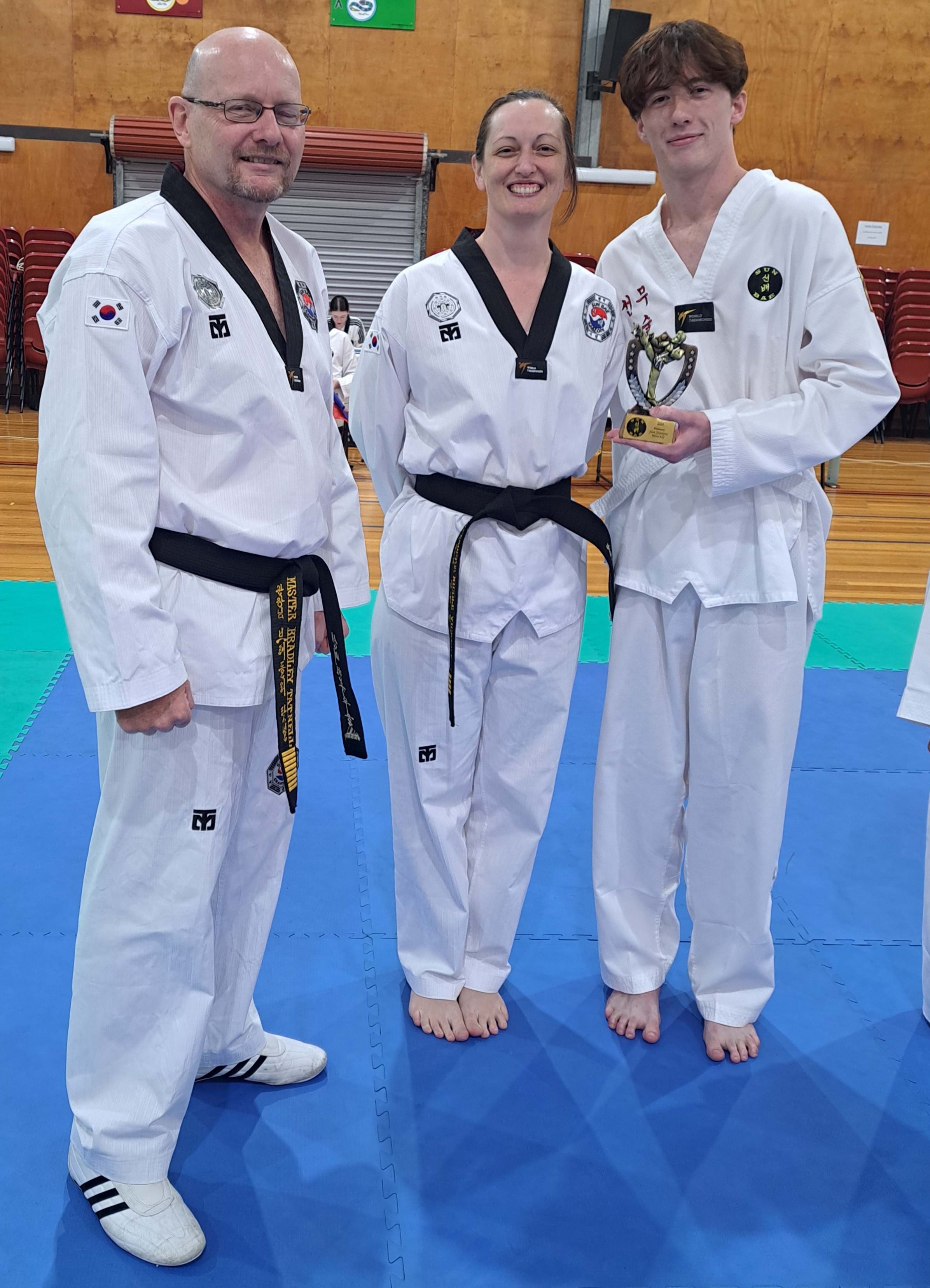 White belt patterns champion: Sun Bae Korean Martial Art - Taekwondo Championship - Patterns, High Kick, Power Breaking, Roof Tiles, Kukkiwon, WT - World Taekwondo, Australia, Brisbane, Centres locations at Kenmore, Newmarket, The Gap, Middle Park, Mt Gravatt, Toowoomba, Grandmaster Bradley Tatnell. competition, white belt, yellow belt, blue belt, red belt, black belt, children, adults, male, female.