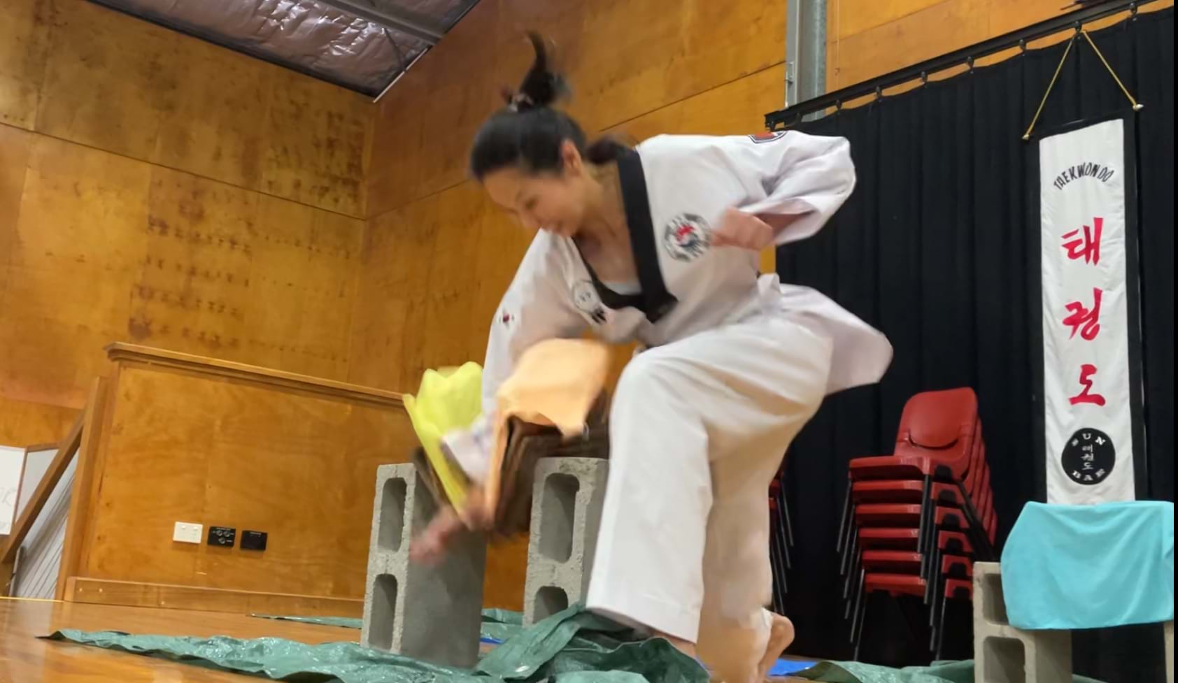 Tile power breaking, Champion, Sun Bae Korean Martial Art - Taekwondo Championship - Patterns, High Kick, Power Breaking, Roof Tiles, Kukkiwon, WT - World Taekwondo, Australia, Brisbane, Centres locations at Kenmore, Newmarket, The Gap, Middle Park, Mt Gravatt, Toowoomba, Grandmaster Bradley Tatnell. competition, white belt, yellow belt, blue belt, red belt, black belt, children, adults, male, female.