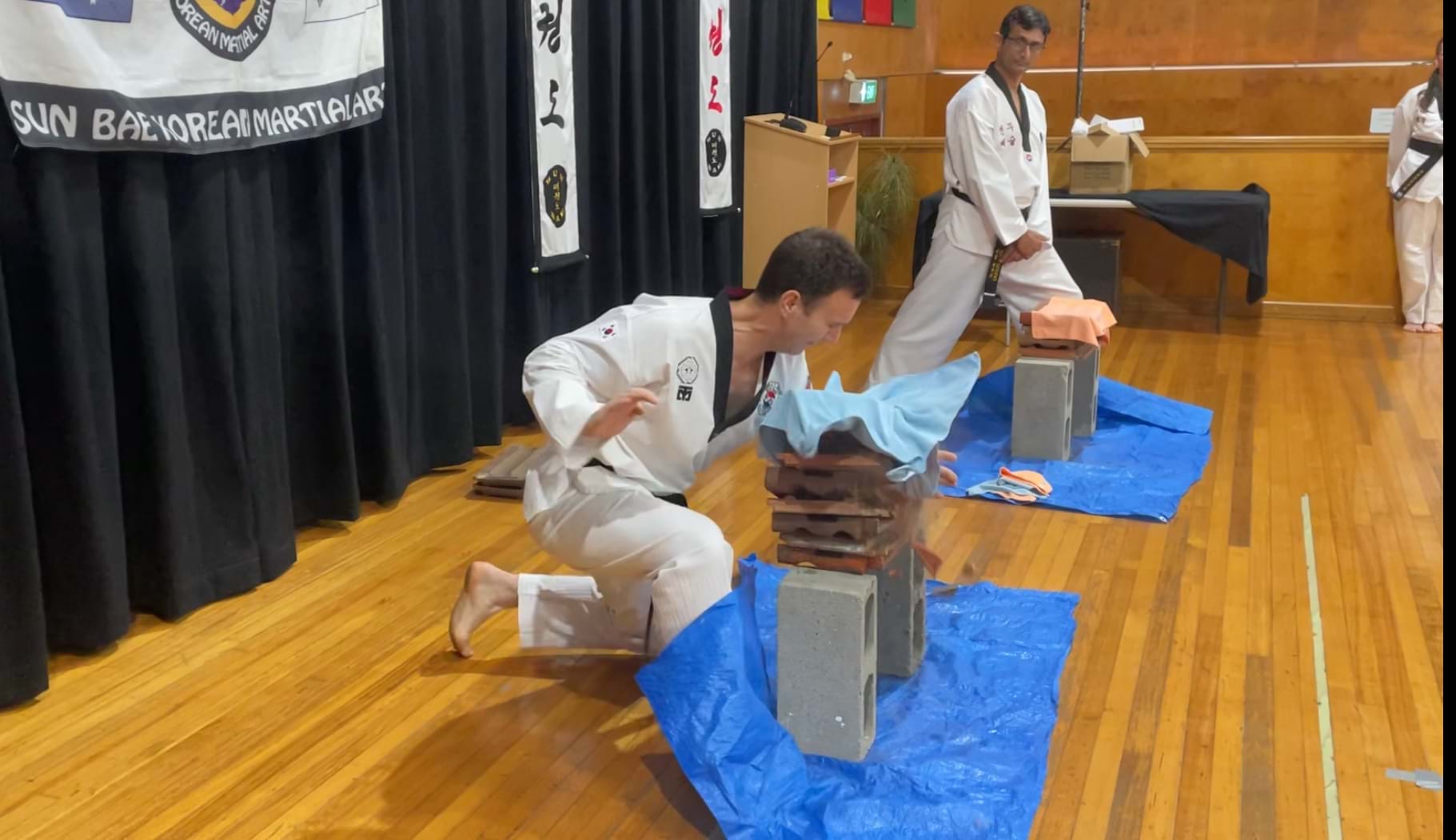 Tile power breaking, Champion, Sun Bae Korean Martial Art - Taekwondo Championship - Patterns, High Kick, Power Breaking, Roof Tiles, Kukkiwon, WT - World Taekwondo, Australia, Brisbane, Centres locations at Kenmore, Newmarket, The Gap, Middle Park, Mt Gravatt, Toowoomba, Grandmaster Bradley Tatnell. competition, white belt, yellow belt, blue belt, red belt, black belt, children, adults, male, female.
