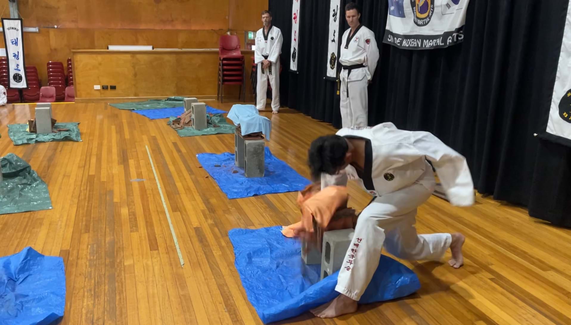 Tile power breaking, Champion, Sun Bae Korean Martial Art - Taekwondo Championship - Patterns, High Kick, Power Breaking, Roof Tiles, Kukkiwon, WT - World Taekwondo, Australia, Brisbane, Centres locations at Kenmore, Newmarket, The Gap, Middle Park, Mt Gravatt, Toowoomba, Grandmaster Bradley Tatnell. competition, white belt, yellow belt, blue belt, red belt, black belt, children, adults, male, female.