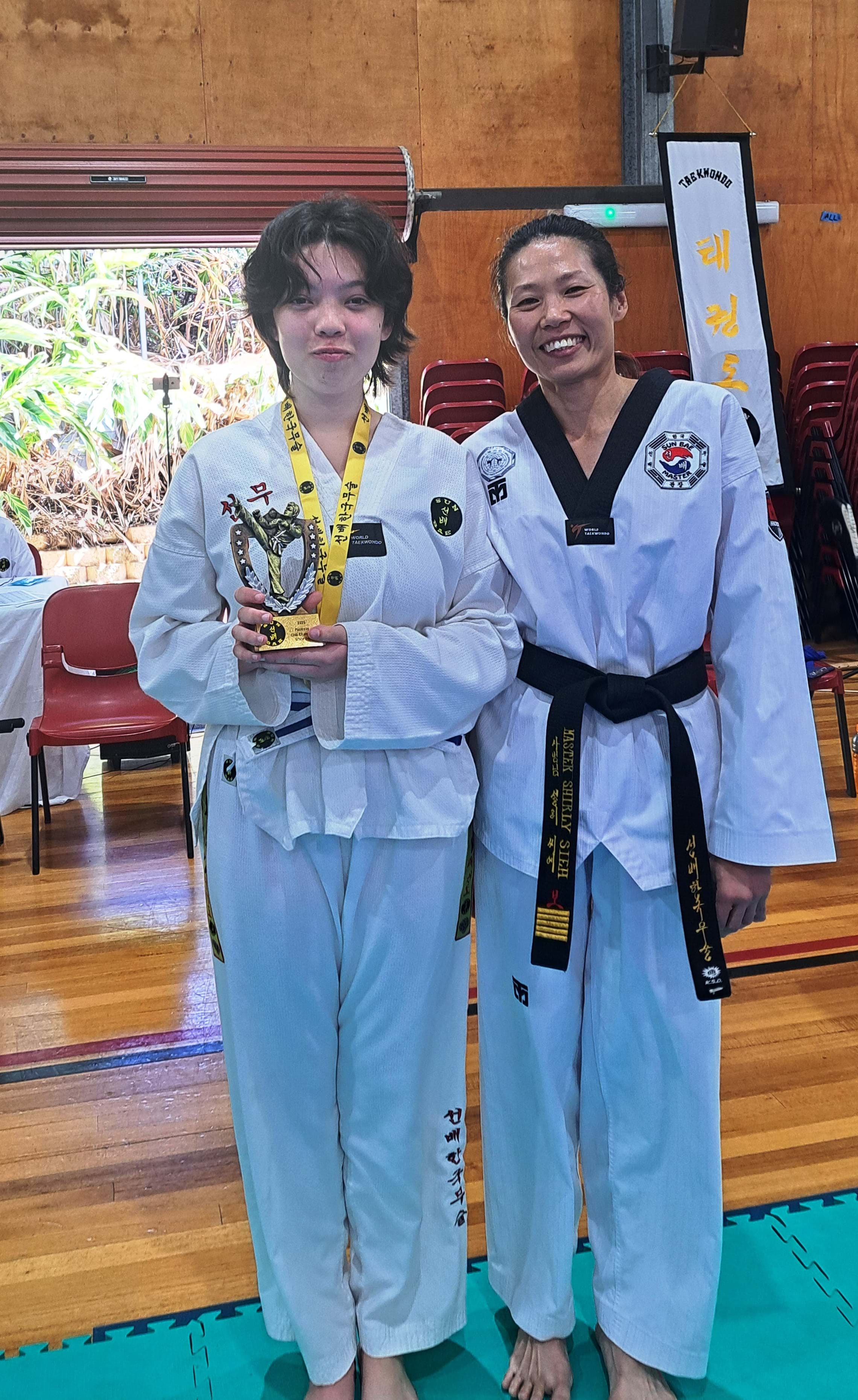 White belt patterns champion: Sun Bae Korean Martial Art - Taekwondo Championship - Patterns, High Kick, Power Breaking, Roof Tiles, Kukkiwon, WT - World Taekwondo, Australia, Brisbane, Centres locations at Kenmore, Newmarket, The Gap, Middle Park, Mt Gravatt, Toowoomba, Grandmaster Bradley Tatnell. competition, white belt, yellow belt, blue belt, red belt, black belt, children, adults, male, female.