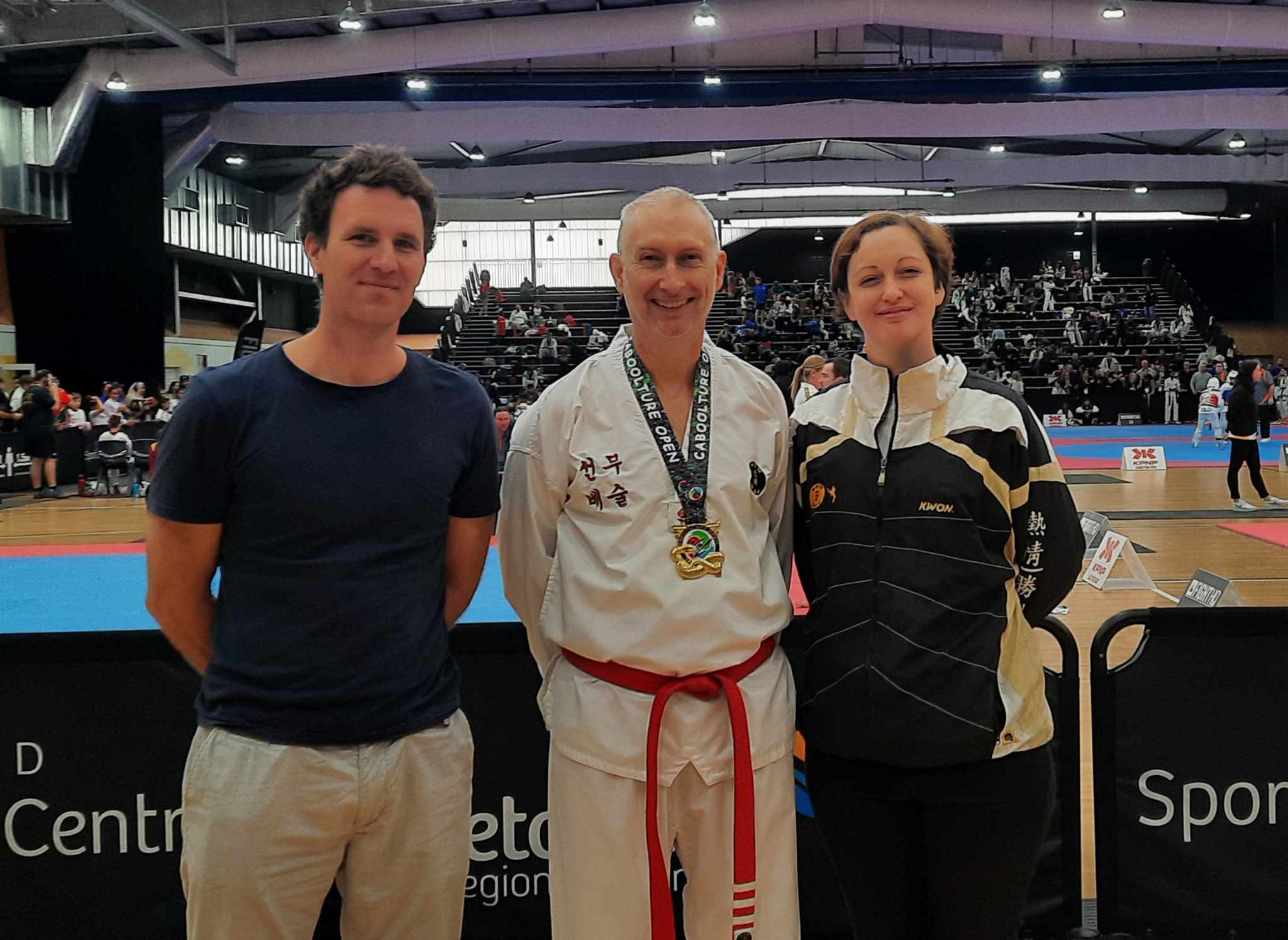 Greg and his Caboolture Open Gold with Instructors Ben and Nicole