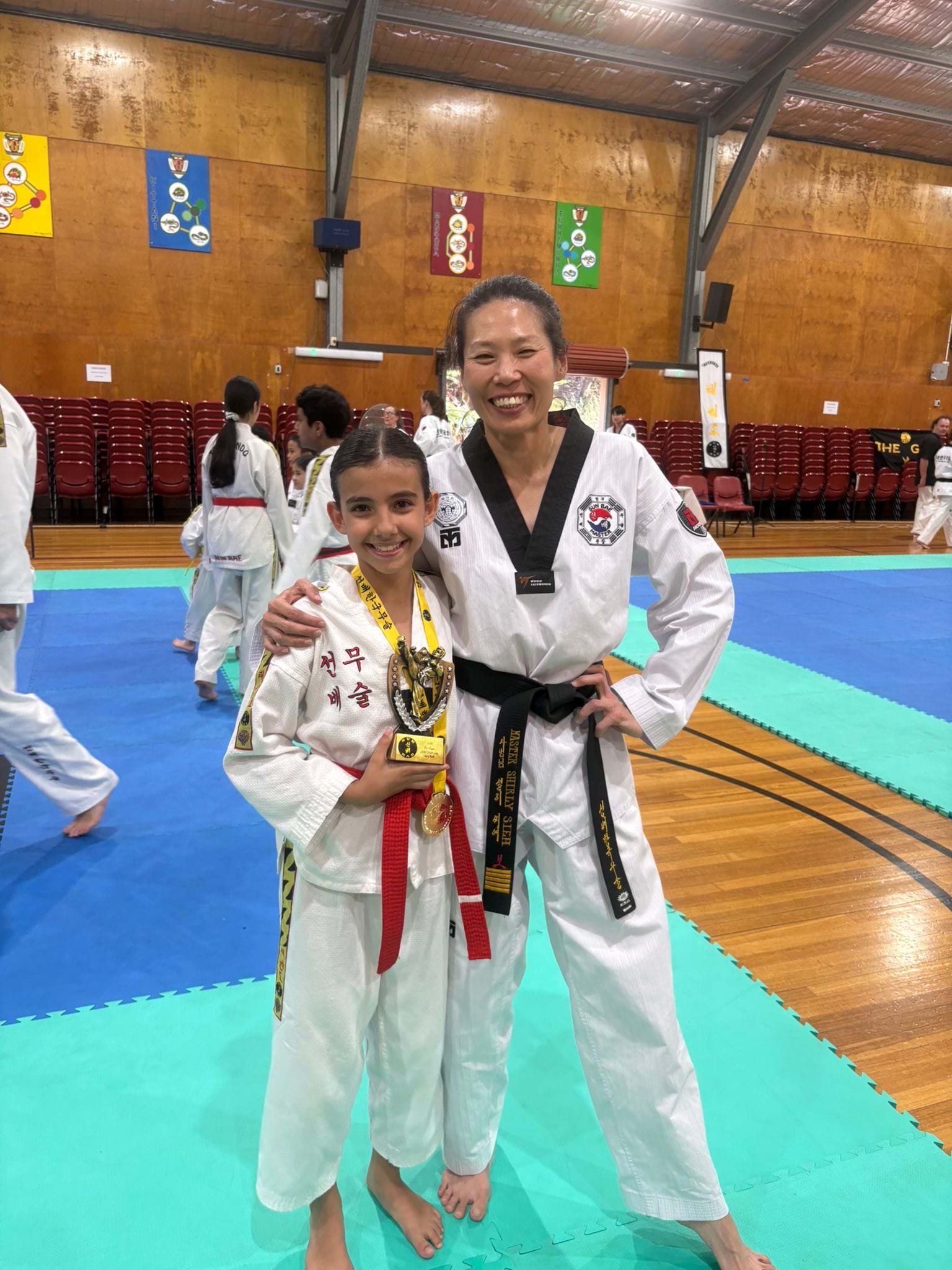 Red belt patterns champion: Sun Bae Korean Martial Art - Taekwondo Championship - Patterns, High Kick, Power Breaking, Roof Tiles, Kukkiwon, WT - World Taekwondo, Australia, Brisbane, Centres locations at Kenmore, Newmarket, The Gap, Middle Park, Mt Gravatt, Toowoomba, Grandmaster Bradley Tatnell. competition, white belt, yellow belt, blue belt, red belt, black belt, children, adults, male, female.