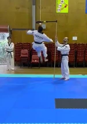 Female highest kick, Shirly Sieh, Champion, Sun Bae Korean Martial Art - Taekwondo Championship - Patterns, High Kick, Power Breaking, Roof Tiles, Kukkiwon, WT - World Taekwondo, Australia, Brisbane, Centres locations at Kenmore, Newmarket, The Gap, Middle Park, Mt Gravatt, Toowoomba, Grandmaster Bradley Tatnell. competition, white belt, yellow belt, blue belt, red belt, black belt, children, adults, male, female.