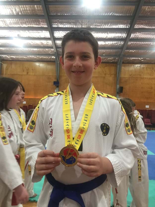Roman wins gold in the Blue Belt Intermediate Division