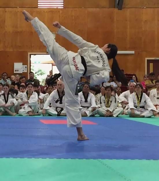 Taekwondo action - Sun Bae Korean Martial Art - Taekwondo Championship - Patterns, High Kick, Power Breaking, Roof Tiles, Kukkiwon, WT - World Taekwondo, Australia, Brisbane, Centres locations at Kenmore, Newmarket, The Gap, Middle Park, Mt Gravatt, Toowoomba, Grandmaster Bradley Tatnell. competition, white belt, yellow belt, blue belt, red belt, black belt, children, adults, male, female.