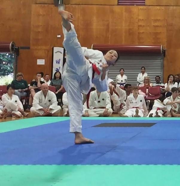 Taekwondo action - Sun Bae Korean Martial Art - Taekwondo Championship - Patterns, High Kick, Power Breaking, Roof Tiles, Kukkiwon, WT - World Taekwondo, Australia, Brisbane, Centres locations at Kenmore, Newmarket, The Gap, Middle Park, Mt Gravatt, Toowoomba, Grandmaster Bradley Tatnell. competition, white belt, yellow belt, blue belt, red belt, black belt, children, adults, male, female.