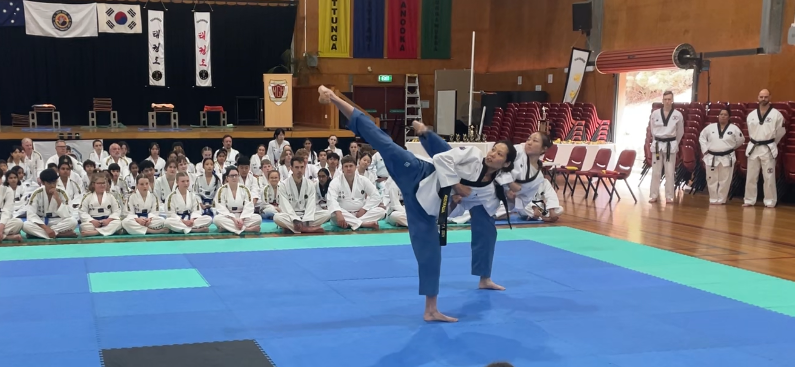 Tile power breaking, Champion, Sun Bae Korean Martial Art - Taekwondo Championship - Patterns, High Kick, Power Breaking, Roof Tiles, Kukkiwon, WT - World Taekwondo, Australia, Brisbane, Centres locations at Kenmore, Newmarket, The Gap, Middle Park, Mt Gravatt, Toowoomba, Grandmaster Bradley Tatnell. competition, white belt, yellow belt, blue belt, red belt, black belt, children, adults, male, female.